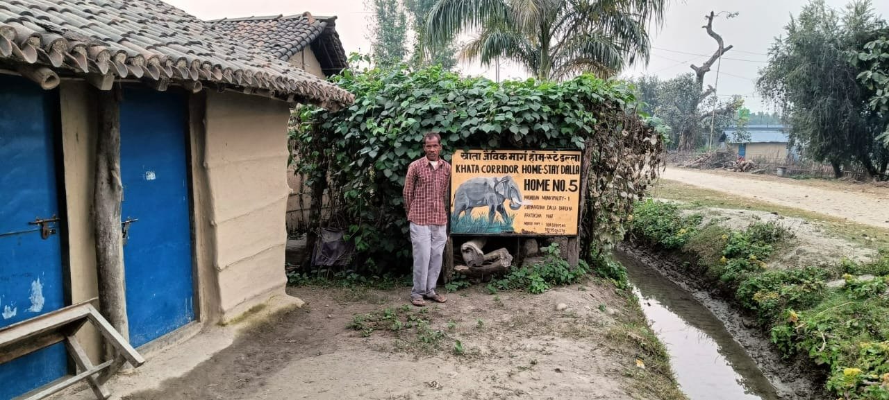 Homestay host infront of homestay