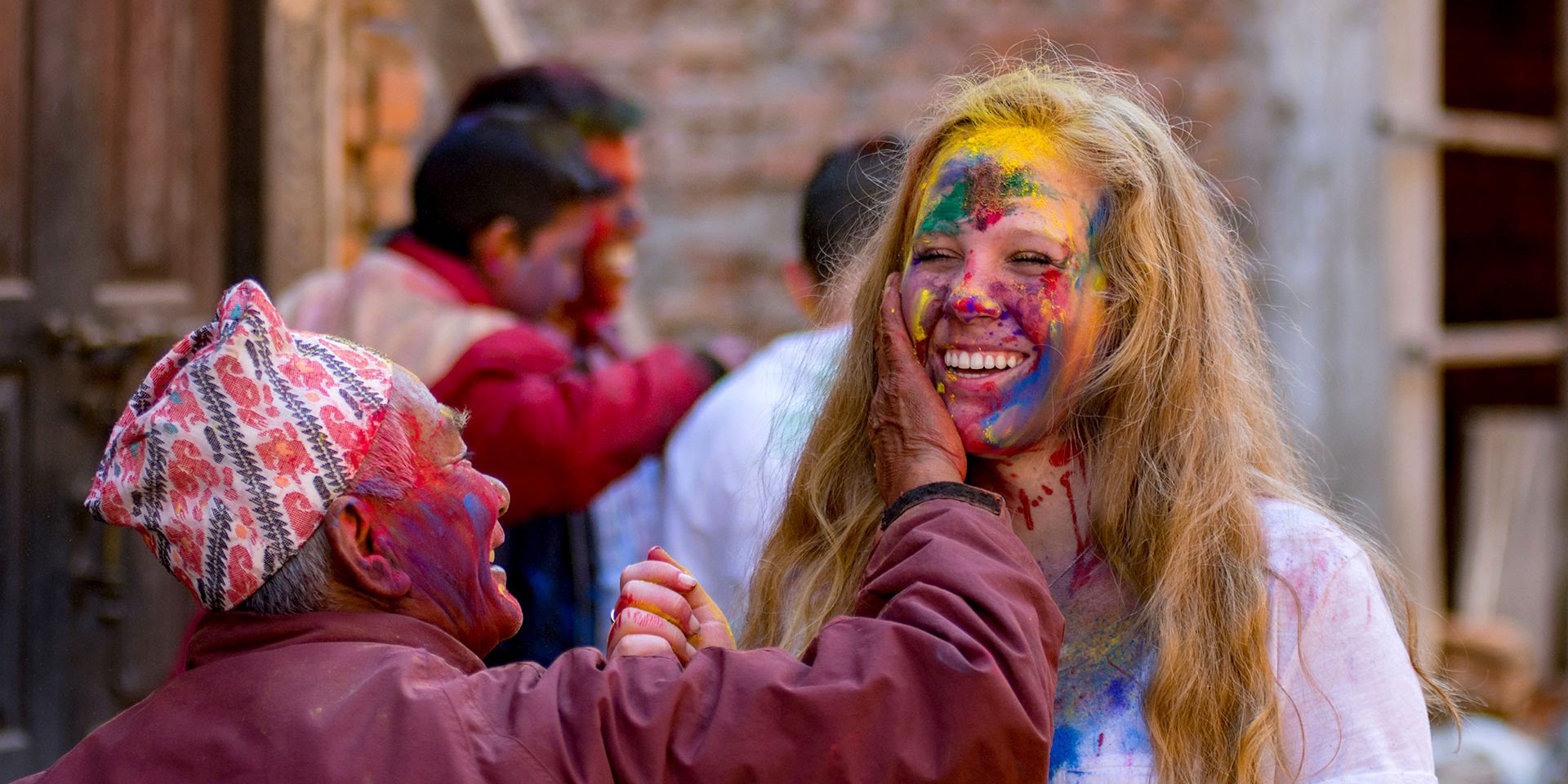Tourist enjoying Holi festival in Nepal