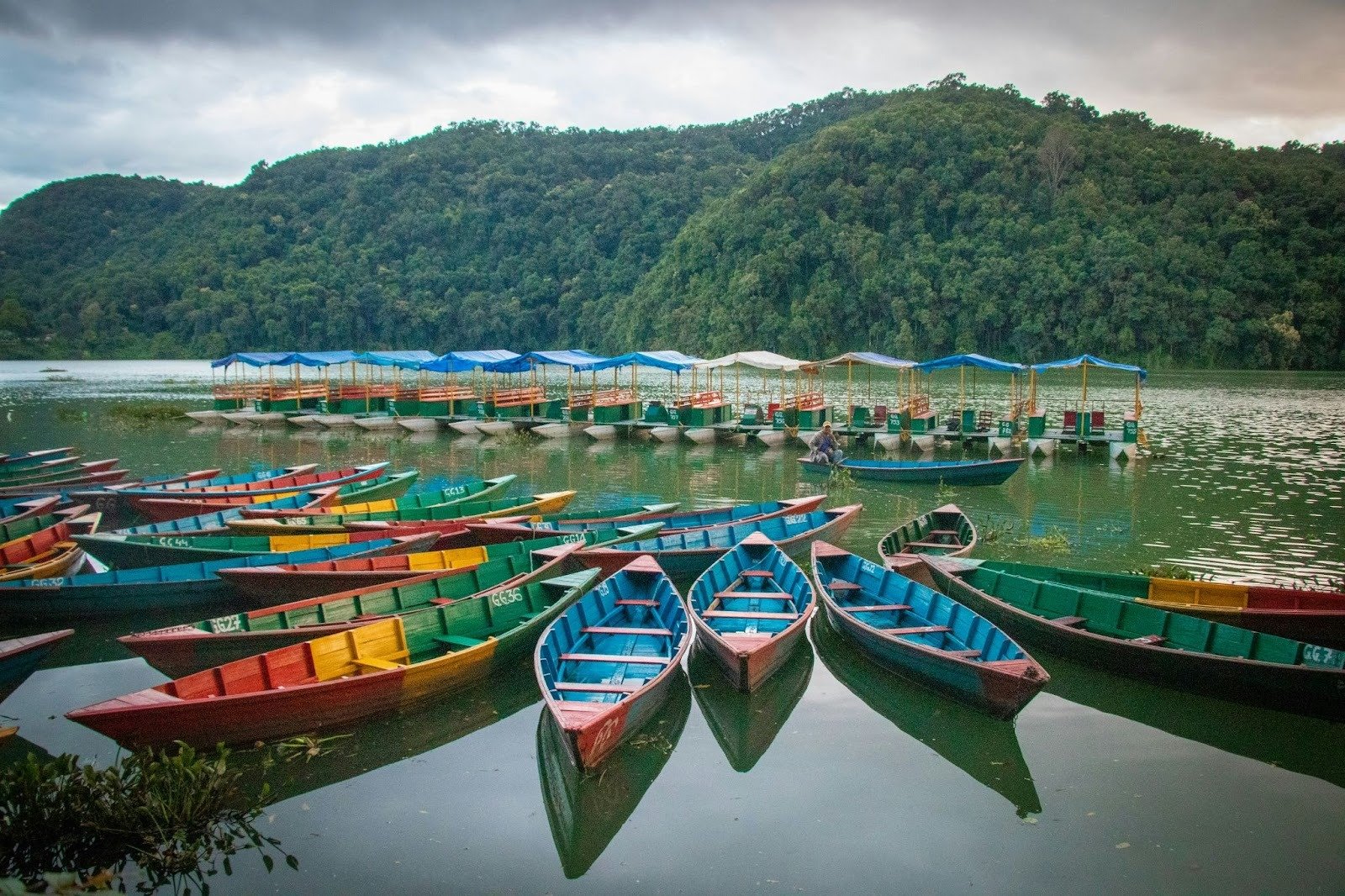 Boat floating on Phewa Lake in Pokhara, Nepal