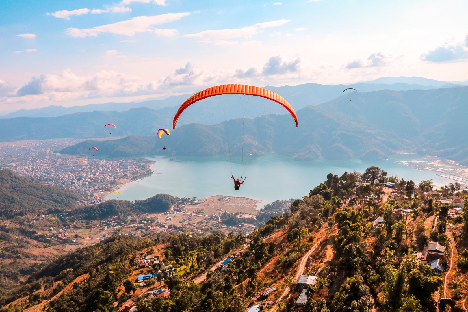 Paragliding above Phewa Lake in Nepal