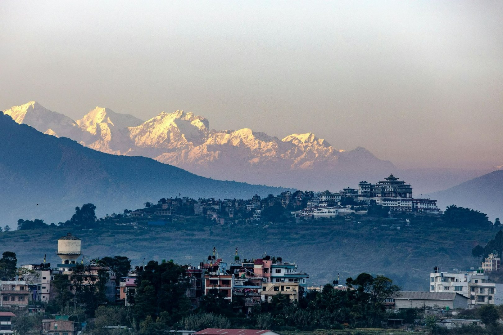 Himalayan range with first sunlight on snow peaks above Bhaktapur valley at dawn